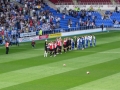 Players emerge onto the magnificent Madejski Stadium pitch